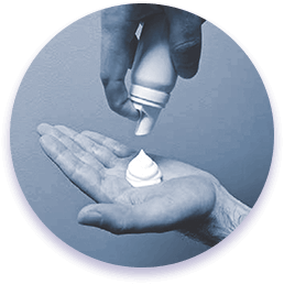 Step 4: A patient dispensing the foam into the palm of their hand
